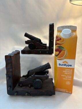 Set of hand carved wooden riveted, mediaeval cannon bookends